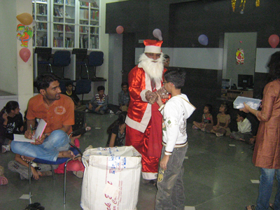 Kids having gala time with Santa Clause